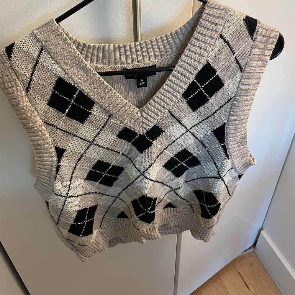 Cream and black argyle sweater vest